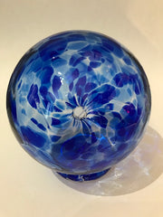 This beautiful blue glass storage bank for wishes, dreams, blessings, and thoughtful ideas includes a notepad of 52 slips of paper on which your treasured thoughts can be recorded and inserted into the wishing ball (or gratitude ball) for safe keeping. Footed glass ball measures approximately 3 and one-half inches in diameter.