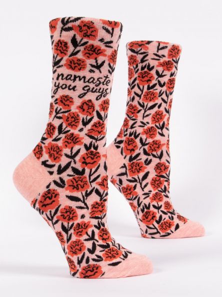 Woman's novelty fun crew sock with legend: "Namaste You Guys"