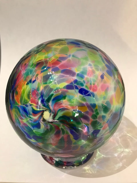 This beautiful multi-color glass storage bank for wishes, dreams, blessings, and thoughtful ideas includes a notepad of 52 slips of paper on which your treasured thoughts can be recorded and inserted into the wishing ball (or gratitude ball) for safe keeping. Footed glass ball measures approximately 3 and one-half inches in diameter. 