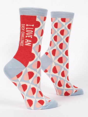 Woman's novelty fun crew sock with legend: "I Love An Easy Challenge"