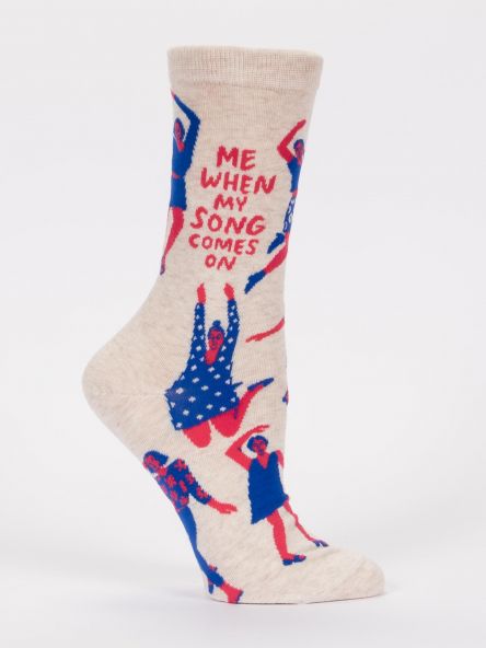 Woman's novelty fun crew sock with legend: "Me When My Song Comes On"