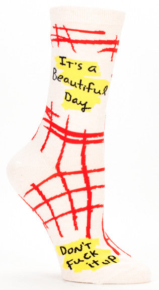 Woman's novelty fun crew sock with legend: "It's A Beautiful Day. Don't Fuck It Up"