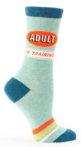 Woman's novelty fun crew sock with legend: "Adult In Training"