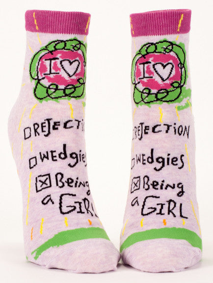 Woman's novelty fun ankle sock with legend: "Love Being A Girl"