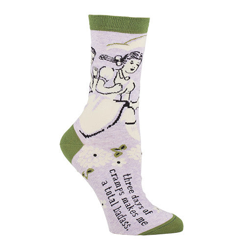 Woman's novelty fun crew sock with legend: "Three Days Of Cramps Makes Me A Badass"
