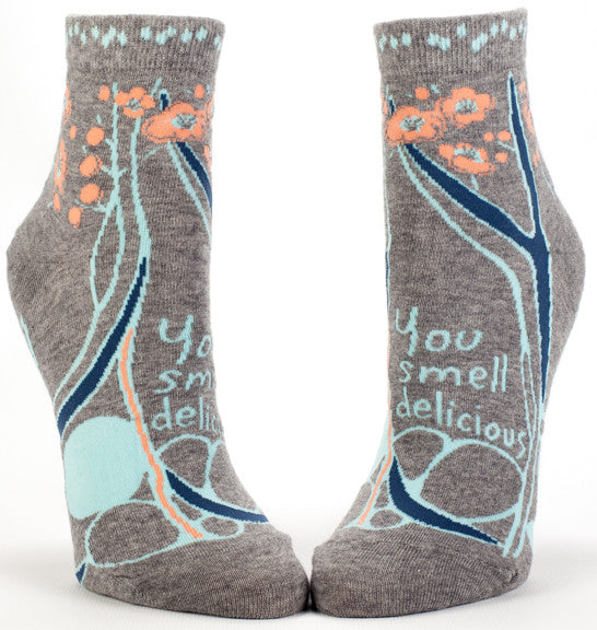 Woman's novelty fun ankle sock with legend: "You Smell Delicious"